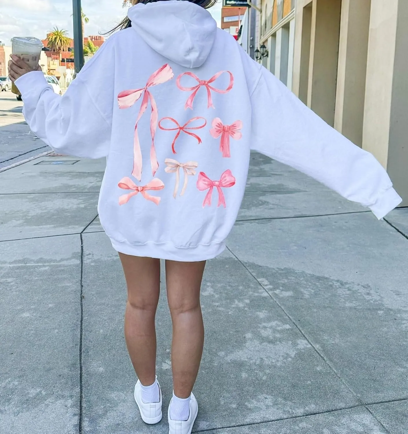Aonoapll Women Bow Print Hoodies Oversized Y2k Graphic Hooded Sweatshirt Cute Long Sleeve Drop Shoulder Pullover Tops